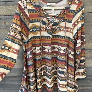 TRIBAL PRINT, SHARK BITE HEM, LONG SLEEVE, LACE UP V NECK TUNIC